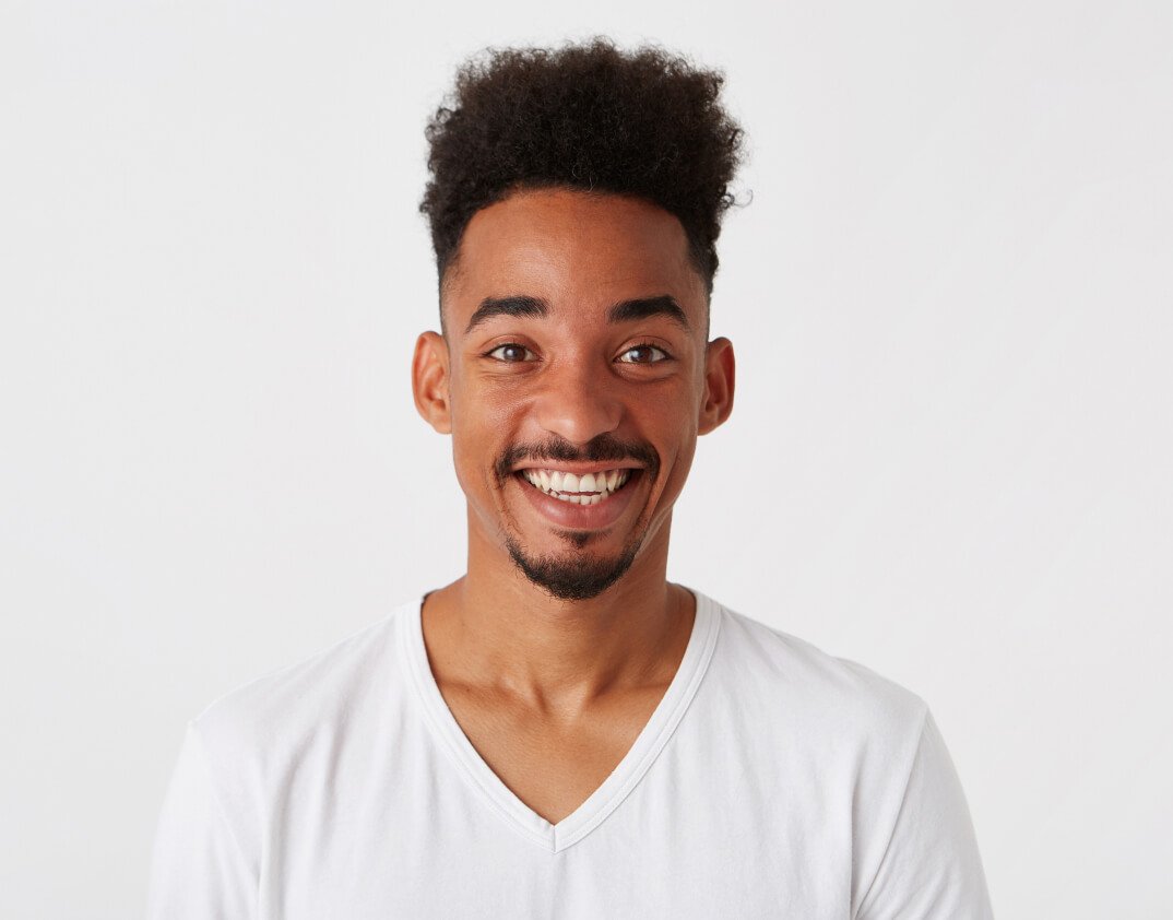 portrait-cheerful-attractive-african-american-young-man 1-1 portrait-cheerful-attractive-african-american-young-man 1-1
